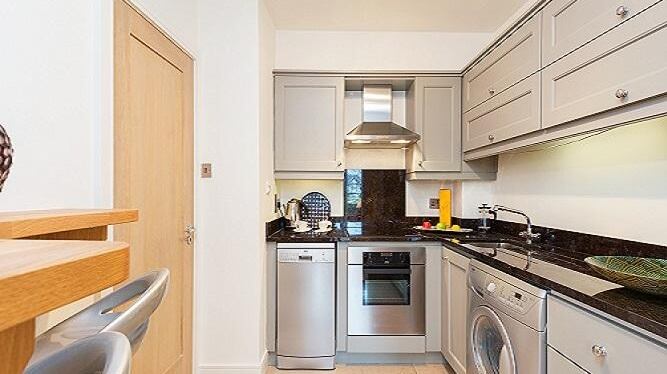 Number 1 the Cedars has a small kitchen that includes a corner breakfast bar, granite countertops and Zanussi appliances.