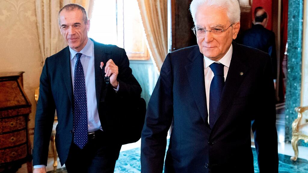 Prime Minister designate Carlo Cottarelli (left) and Italian President Sergio Mattarella (right) are due to meet again on Wednesday.