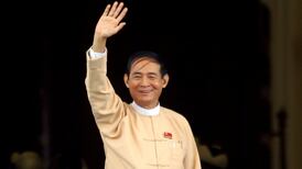 Myanmar parliament elects Suu Kyi confidant as new president
