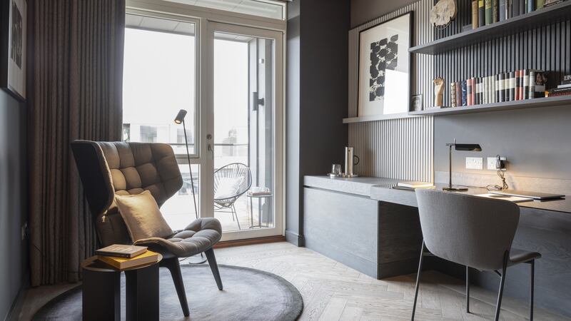 Third bedroom in show penthouse fitted out as a home office, with access to balcony.