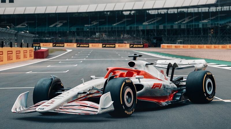 This car is clad in a paint that in normal light looks white and red, but that’s not the entire story.