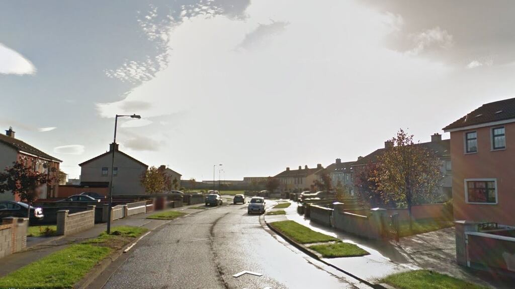 A 21-year-old man is receiving treatment for non life-threatening injuries after being shot on Cherry Orchard Parade (general view above) on Thursday night. File photograph: Google Street View