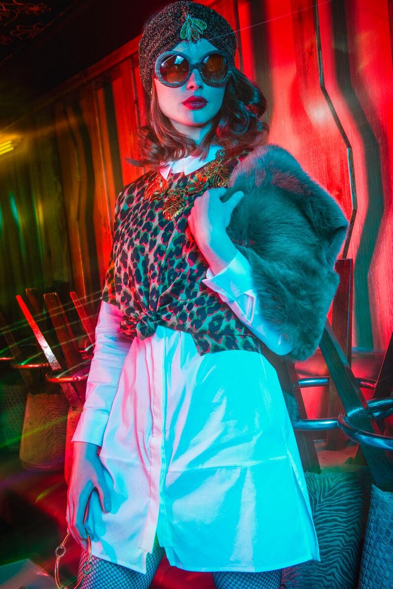 White shirt (¤79.99), red leopard print top (¤90), Sheepskin scarf (¤199) Olori Boutique, Cork. Lurex turban (¤25), bug brooch (¤12) all from Moda Mallow, Cork. Bag (¤48.95) Contempo, Mallow, Cork. Knee high boots (¤85) Shooz Footwear & Accessoires, Mallow, Cork. Fishnet tights (¤5) Topshop, Opera Lane, Cork. Junge bug chain (¤65), retro sunglasses (¤25) both from Isabella Ru, Cork