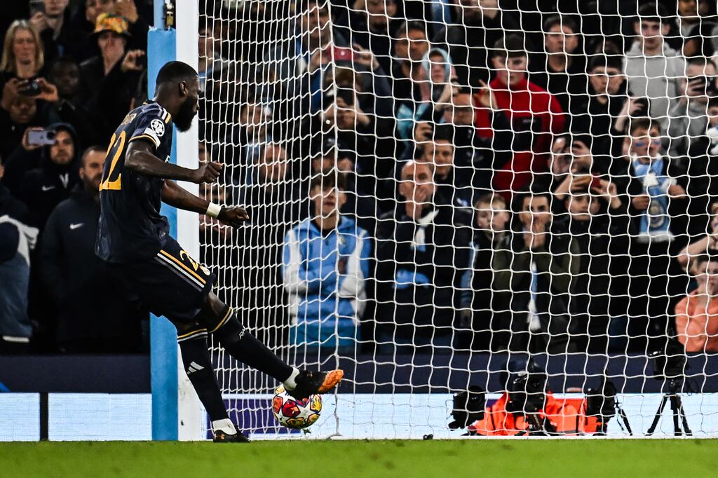 Real Madrid's defender Antonio Rudiger scores the winning penalty. Photograph: Paul Ellis/AFP via Getty