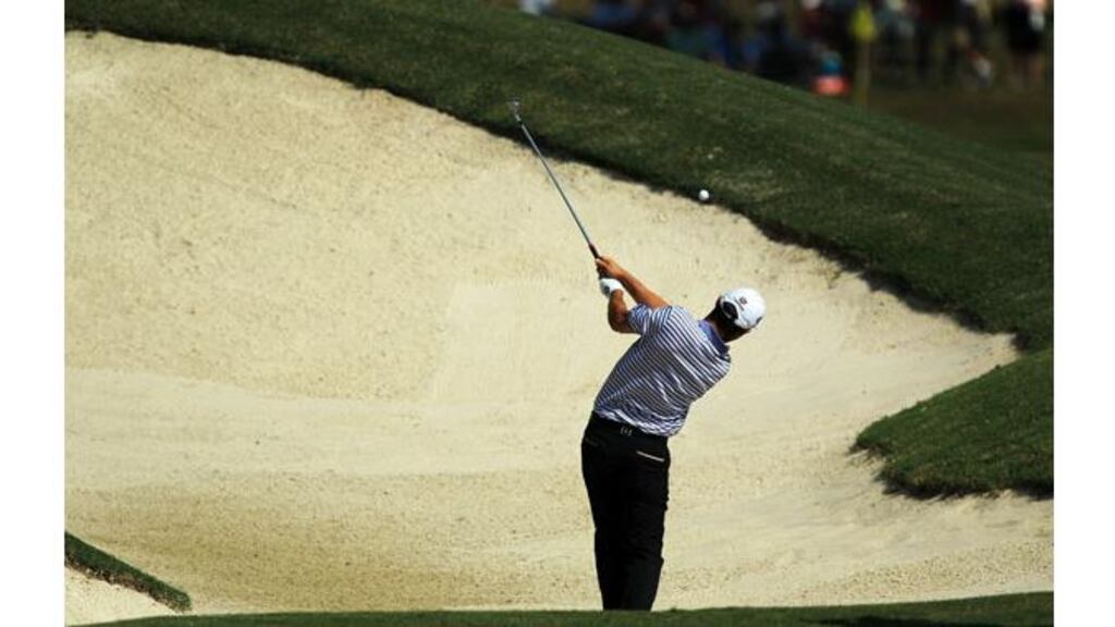 Padraig Harrington hits out of a bunker on the 11th hole during the second round of the US PGA Championship. Photograph: David Cannon/Getty Images