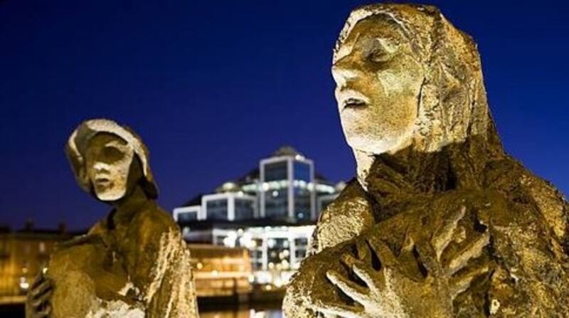 Sculptures of Famine victims on Dublin’s Custom House Quay. In 1847, 1,490 starving tenants from the Mahon estate in Strokestown marched to Dublin to board a coffin ship for Canada. Photograph: Getty Images