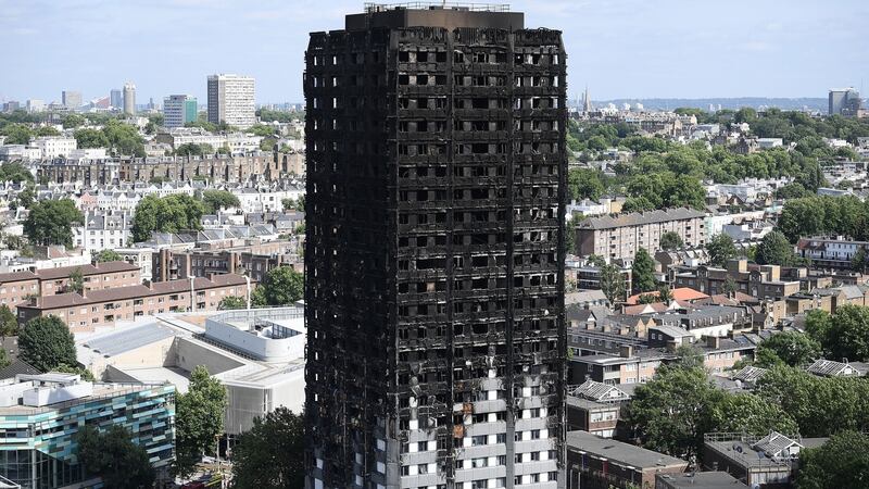 Grenfell Tower seen from a neighbouring tower block in Kensington, London. A police spokesman said some of the remains may never be identified. Photograph: Carl Court/Getty Images