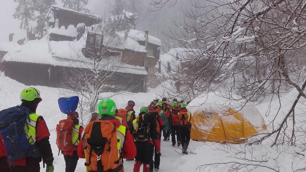 Rescue workers continue to search for the 24 missing people four days after an avalanche hit the Hotel Rigopiano in the Abruzzo region of Italy. Photograph: EPA/Soccorso Alpino