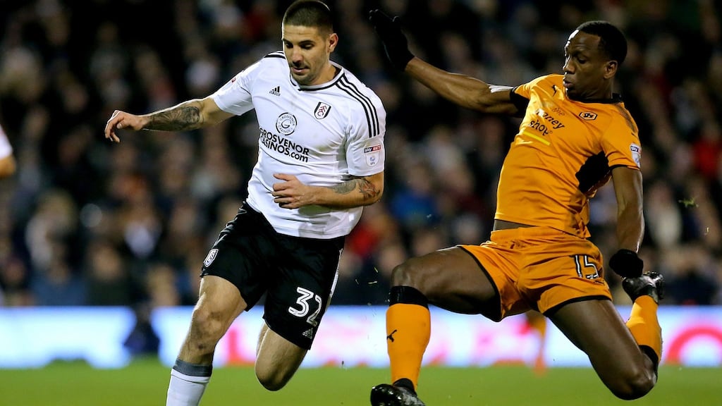 Wolverhampton Wanderers’ Willy Boly puts in a tackle on Fulham’s Aleksandar Mitrovic during the Championship match at Craven Cottage, London. Photo: Mark Kerton/PA Wire