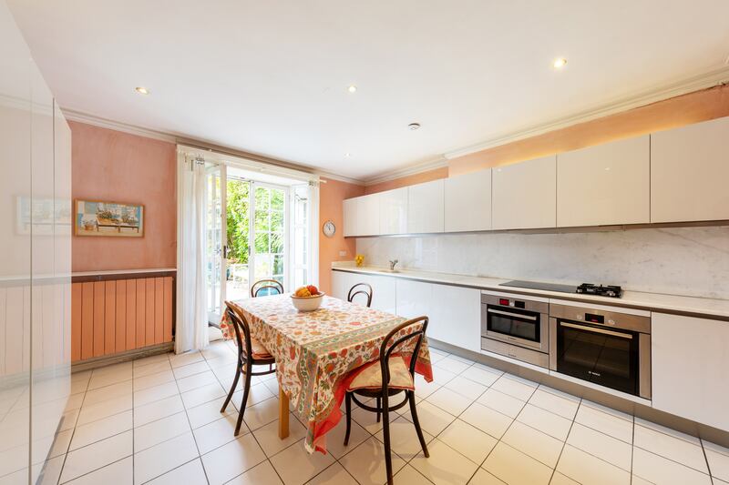 The simple kitchen is at basement kevel