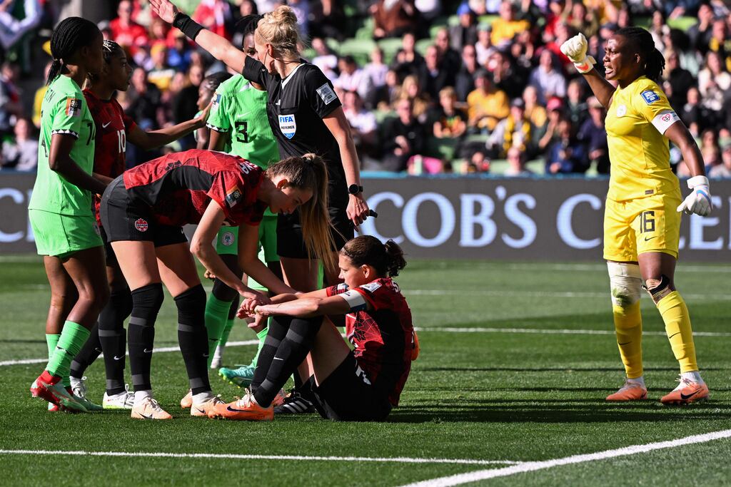 Canada's Christine Sinclair after missing a penalty as Nigeria goalkeeper Chiamaka Nnadozie celebrates. Photograph: Getty Images