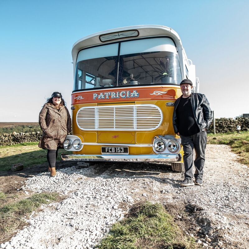 Johnny Vegas with his assistant and best friend, Bev, standing beside his Maltese bus. Photograph: Channel 4