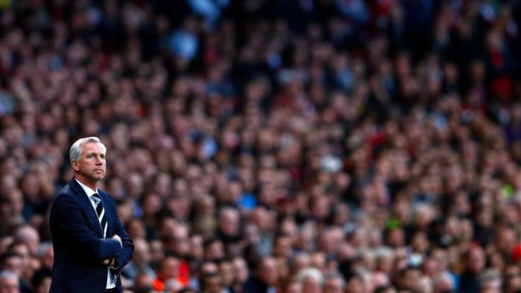 Newcastle United manager Alan Pardew watches his team during their 3-0 defeat at Arsenal. Photograph: Eddie Keogh/Reuters