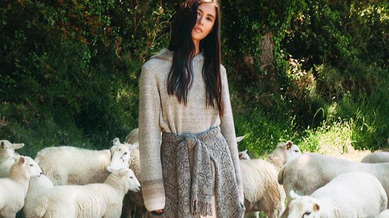 Cream silk dress €2,085 by Roksanda, grey cashmere hoodie €1,250, grey cashmere cardigan worn around waist €1,450, all by Lainey Keogh.