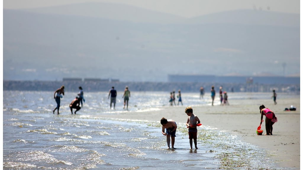 Enjoying the spectacular sunshine on Dollymount Strand, Dublin yesterday. Photograph: Bryan O’Brien