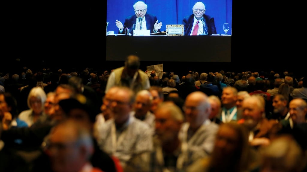 Berkshire Hathaway shareholders watch the company’s annual meeting, at which Buffett and Munger rued several of the tech investments they never made. Photograph: Rick Wilking/Reuters