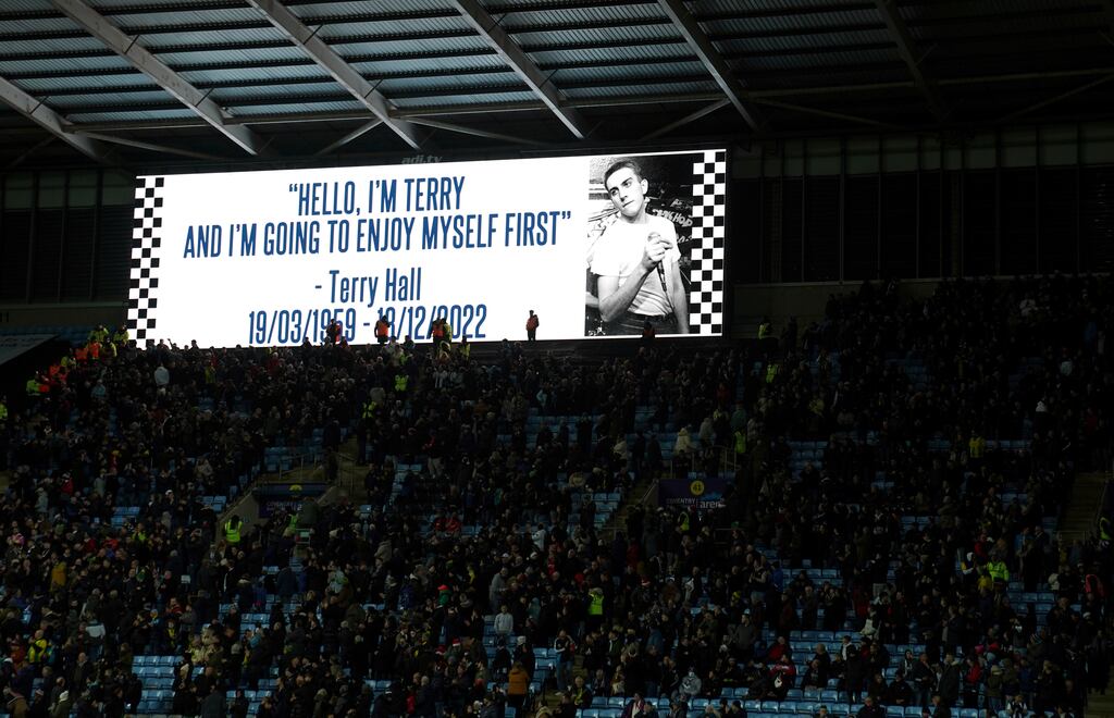 A tribute to Terry Hall – frontman for The Specials, on the big screen before the Championship game between Coventry City and West Bromwich Albion at the Coventry Building Society Arena, Coventry. Photograph: Joe Giddens/PA Wire/PA Images