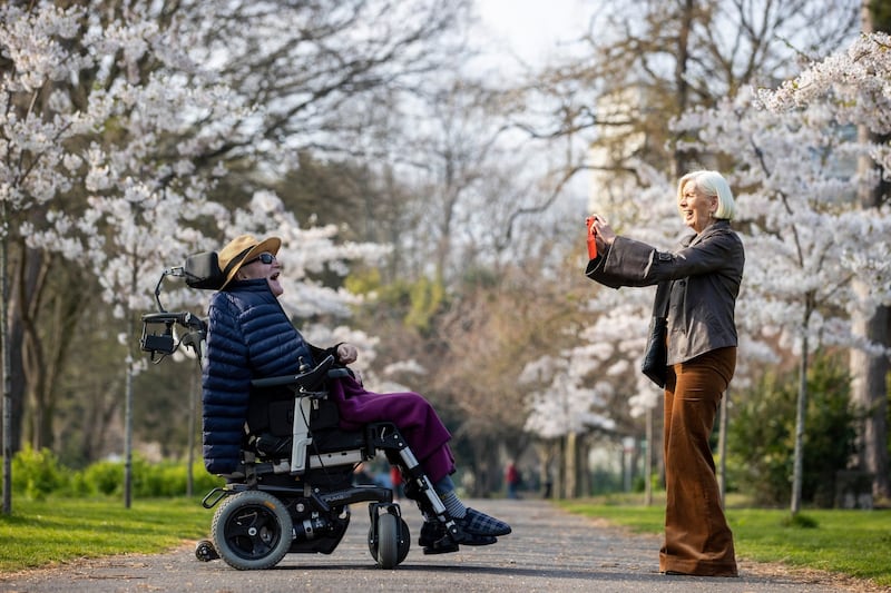 Bernadette McCloskey and her husband, Brian Kieran, enjoying the sunshine in Herbert Park, Dublin. Photograph: Tom Honan