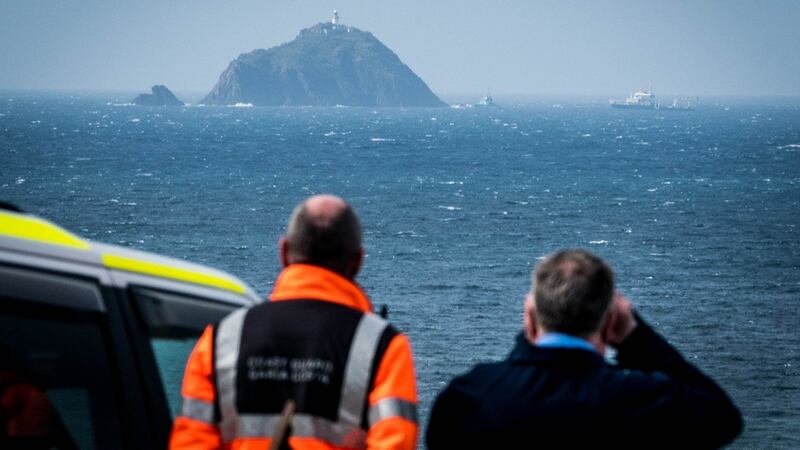 Coast Guard personnel view the R116 recovery operation at Blackrock Island in 2017. Photograph: Keith Heneghan/Phocus