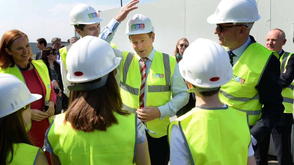 Taoiseach Enda Kenny with Minister for Health Simon Harris at the site of the National Children’s Hospital, at St James’s Campus, Rialto, Dublin. Photograph: Dara Mac Dónaill/The Irish Times