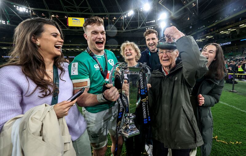 Ireland’s Josh van der Flier celebrates winning with his grandfather George Strong. Photograph: Dan Sheridan/Inpho
