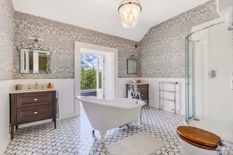 Bathroom with French doors to balcony