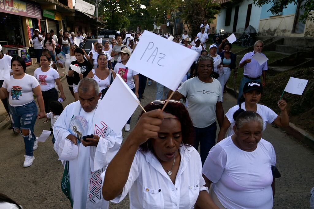 Locals take part in a march against violence following a car bombing last week in Timba, department of Cauca, Colombia, on in September. A car bomb attack targeting a police station in southwest Colombia killed two people in a region plagued by a guerrilla group in talks with the government. Photograph: Joaquin Sarmiento/AFP via Getty Images