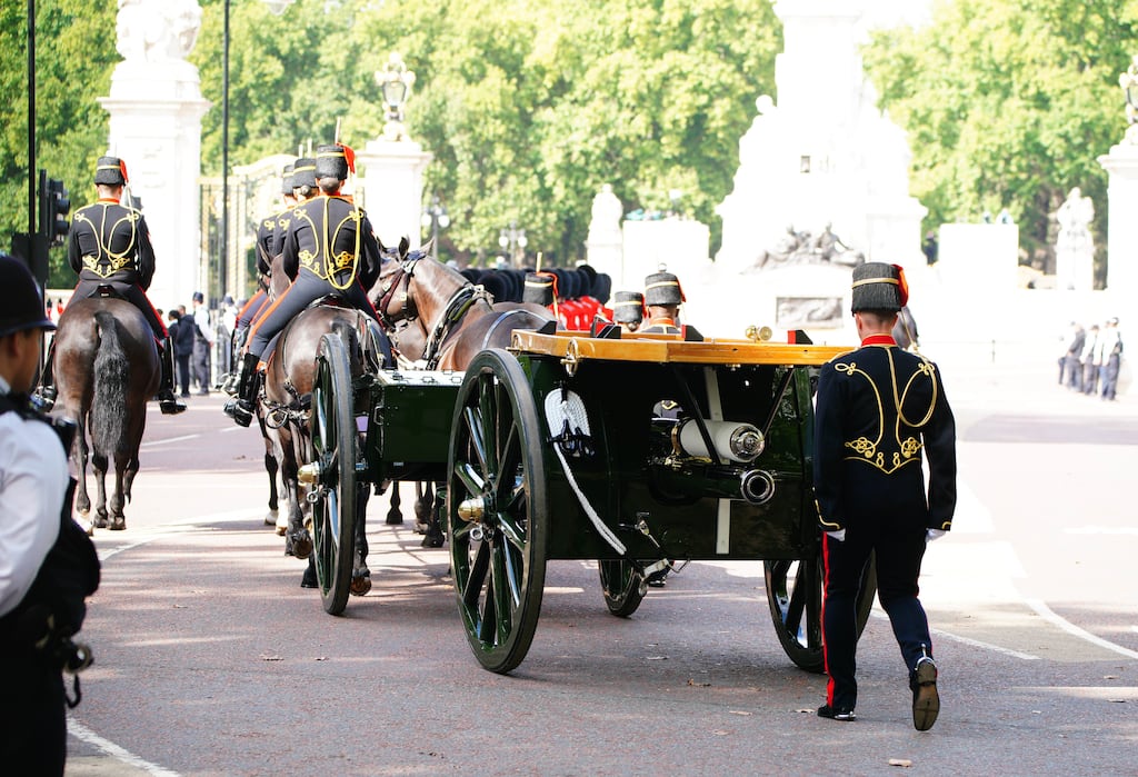 Queen Elizabeth II's coffin is taken in procession on a gun carriage from Buckingham Palace to Westminster Hall. Photograph: Ben Birchall - Pool/Getty Images