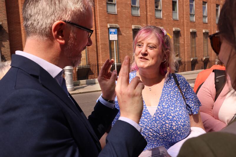 Avril Green of Siptu speaking to Green Party leader Roderick O’Gorman at the protest. Photograph: Dara Mac Dónaill