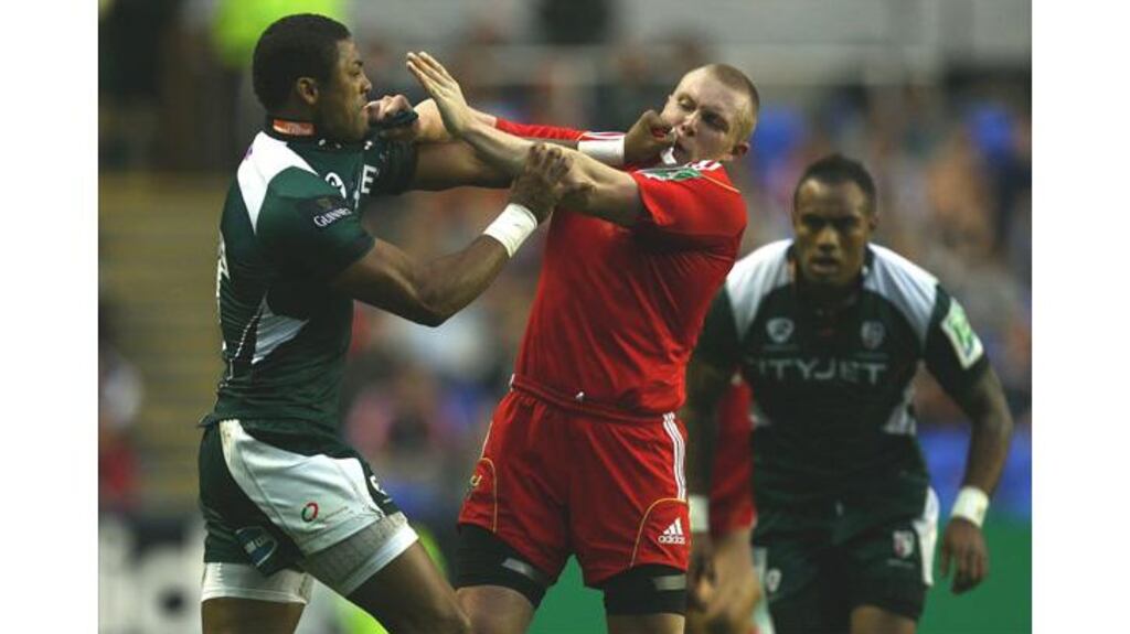 Munster's Keith Earls clashes with Delon Armitage of London Irish at the Madejski Stadium on October 9th, 2010, in Reading, England. - (Photograph: Richard Heath/Getty Images)