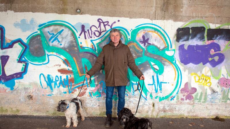 John Spillane out walking with his two Tibetan terriers near his home in Passage West, Cork. Photograph: Michael MacSweeney/Provision