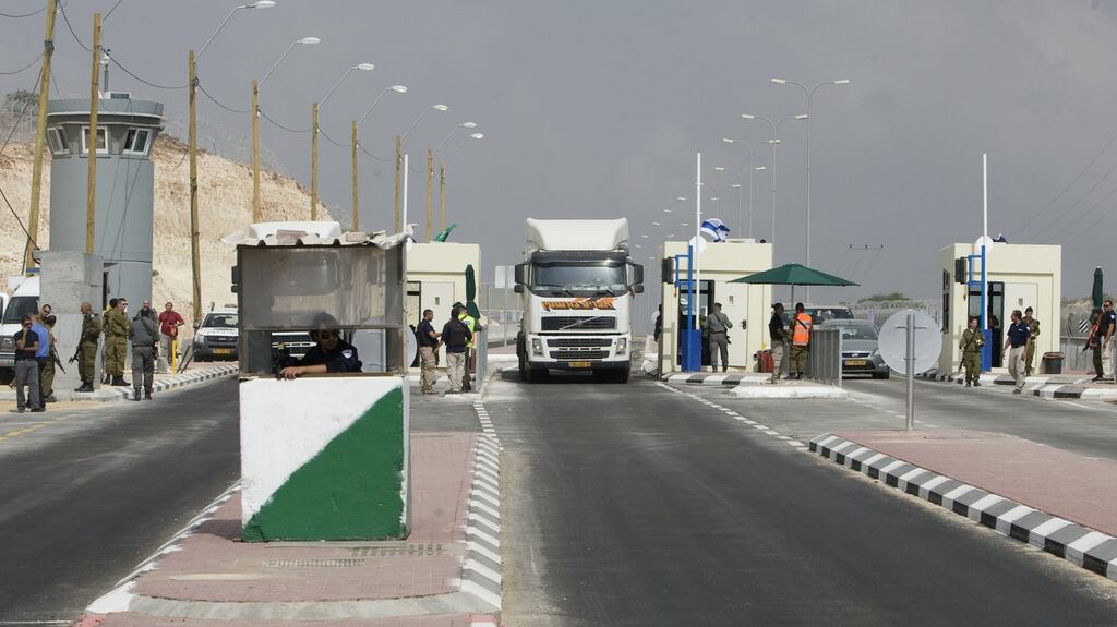 An Israeli-controlled checkpoint at the entrance to Highway 443 in the West Bank: Soldiers in the area opened fire on a Palestinian vehicle on an adjacent road after petrol bombs and rocks were thrown at Israeli vehicles. Photograph: Ahmad Gharabli/AFP/Getty