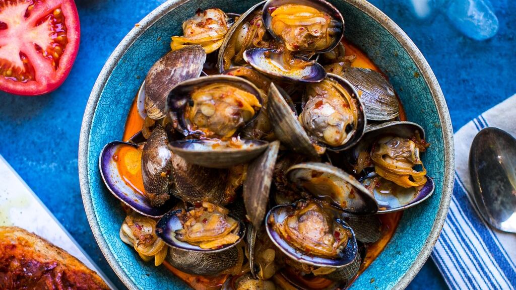 ‘Nduja clams and tomato toasts.