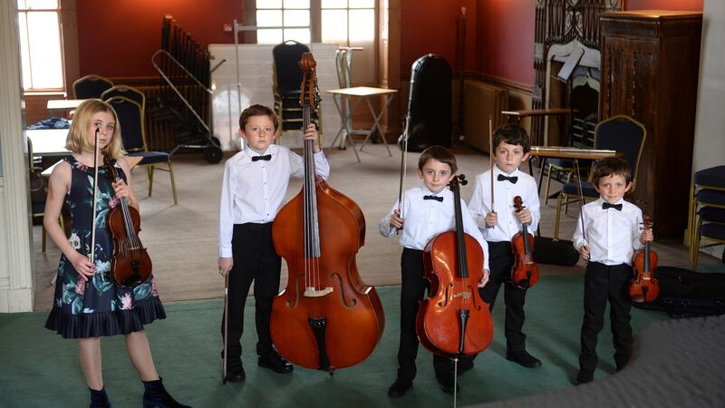Fom left; Clara, Maitiú, Daire, Oscar and Rossa Mhic Síomóin, at the RIAM, Westland Row, Dublin. Photograph: Dara Mac Donaill