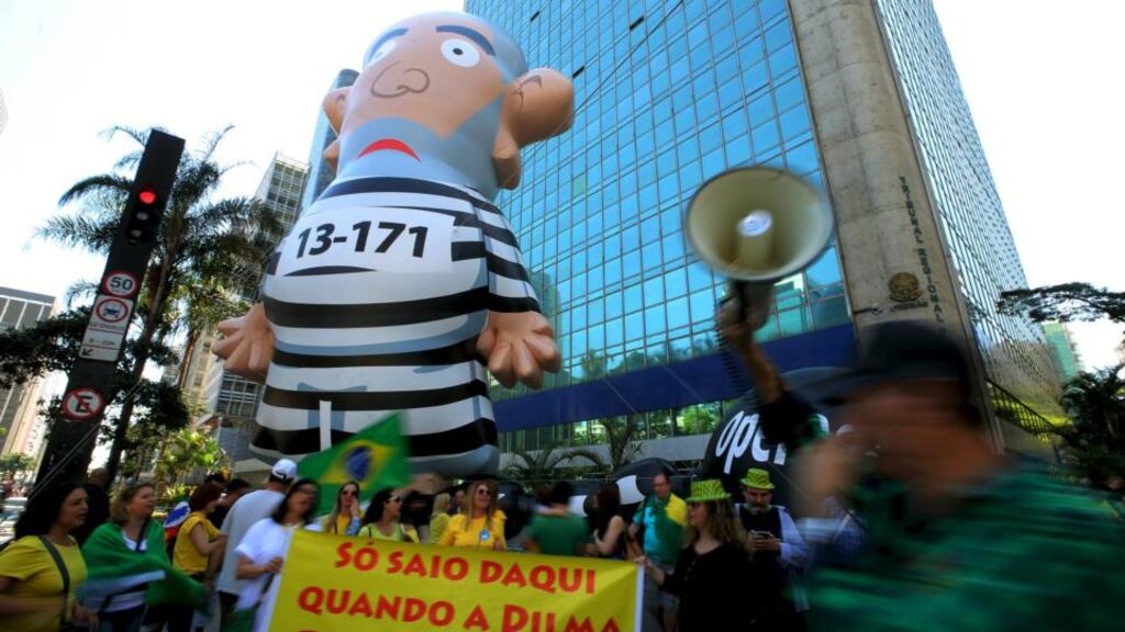 An inflatable doll depicting former Brazilian president Luiz Inacio Lula da Silva in prison attire during a recent protest against Brazil’s President Dilma Rousseff in São Paulo. photograph: paulo whitaker/reuters