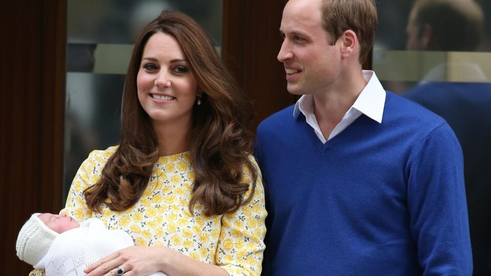 A ceremonial town crier holds a scroll after announcing the birth of a baby girl to royal fans and members of the media outside the entrance to the Lindo wing of St Mary’s Hospital in London on Saturday. Photograph: Cathal McNaughton/Reuters