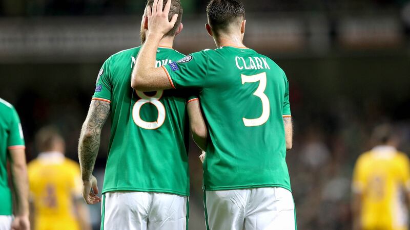 Ciaran Clark celebrates with Daryl Murphy after his second goal against Moldova. Photo: Ryan Byrne/Inpho