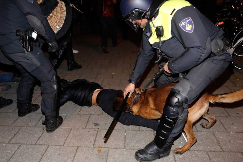 Dutch police clear the streets from demonstrators near the Turkish consulate in Rotterdam on Sunday morning. Photograph: EPA