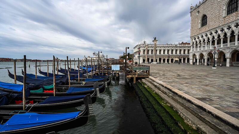 Gondolas moored at the Riva degli Schiavoni embankment by the Doge’s Palace in Venice on May 13th. Photograph: Vincenzo Pinto/AFP via Getty Images