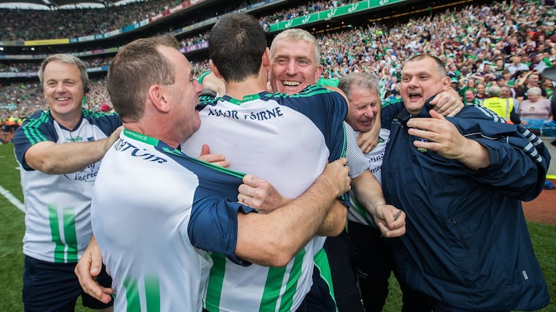John Kiely celebrates with his backroom team, including Eamon O’Neill (right) at the final whistle. Photograph: Inpho/Tommy Dickson
