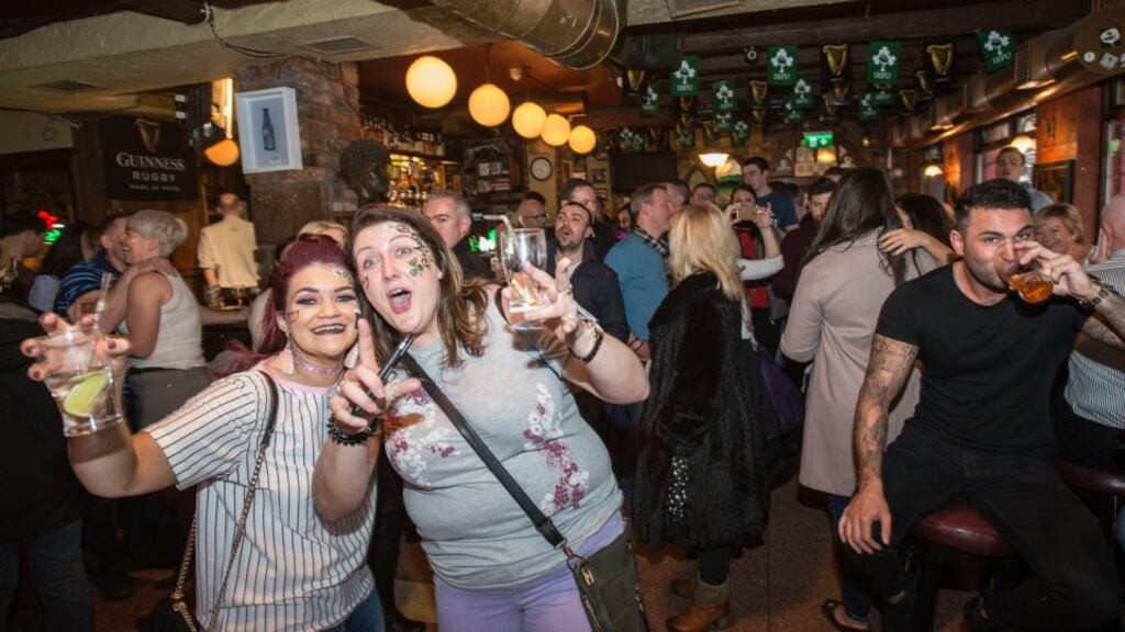 Grace Allen and Emma Ireland from Ballymena enjoying Good Friday drinks in The Auld Dubliner in Dublin. Photograph: Dave Meehan/The Irish Times