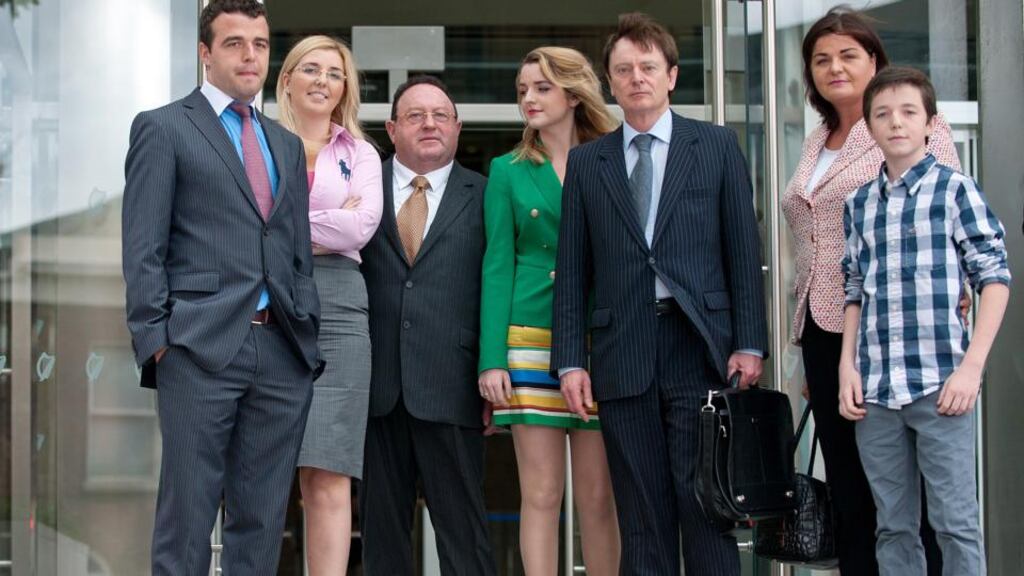 James Kennedy with his wife Antoinette, family and his legal team leaving Dublin Circuit Criminal Court yesterday.   Photograph: Collins Courts.