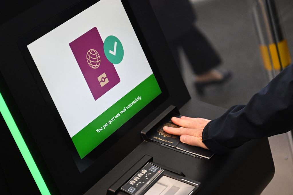 A person's passport is scanned using the Schengen area's new border-check system for non-EU nationals. Photograph: Justin Tallis/AFP via Getty Images