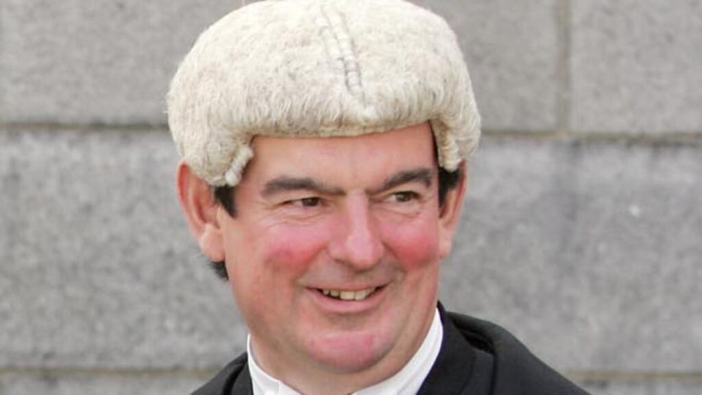 Mr Justice George Birmingham (above) ruled today that Gerry Burns, who was not present in court, was in contempt of a court order