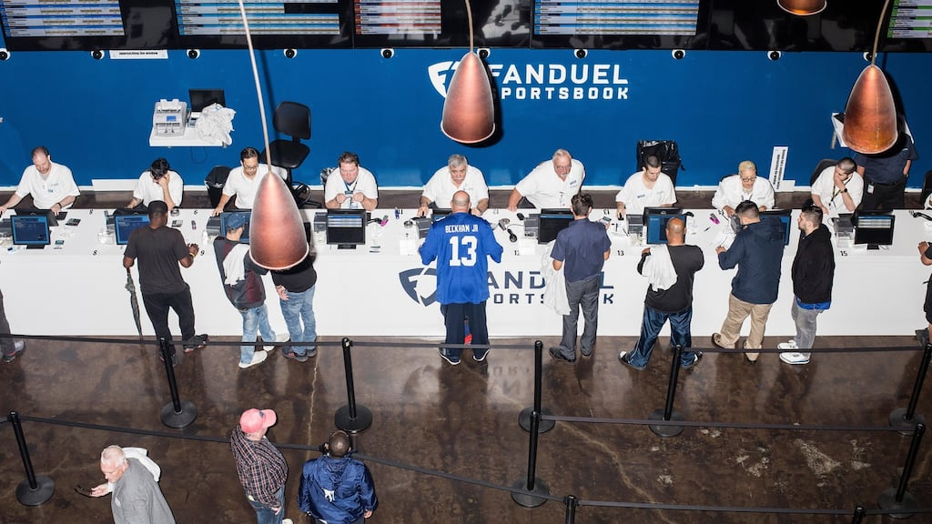 Gamblers wager at one of the betting booths in the FanDuel Sportsbook, a legal sports-betting venue, at Meadowlands Racetrack in East Rutherford, New Jersey. Photo: Bryan Anselm/The New York Times