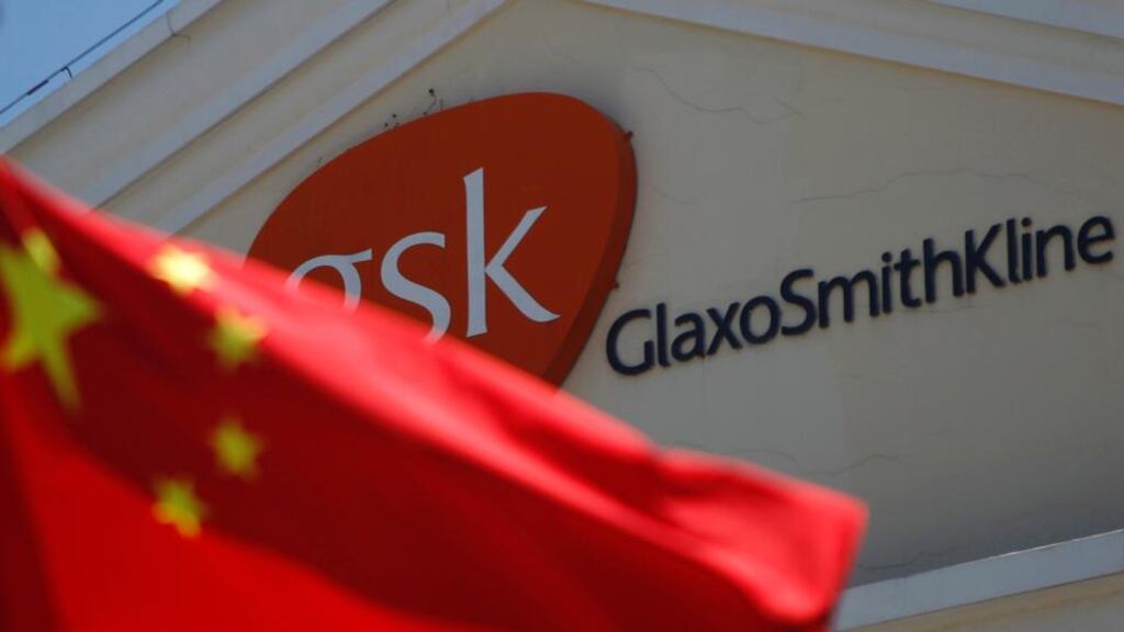 A Chinese national flag is seen in front of a GlaxoSmithKline office building in Shanghai. Photograph: Aly Song/Reuters