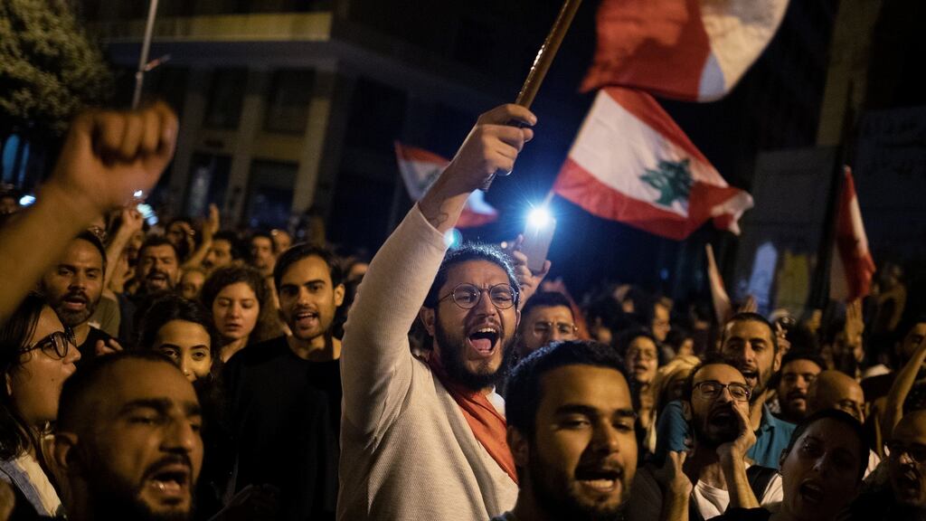 Demonstrators shout slogans during ongoing anti-government protests in downtown Beirut on Saturday. Photograph: Alkis Konstantinidis/Reuters