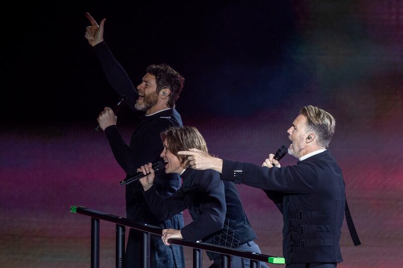 Take That's Gary Barlow, Howard Donald and Mark Owen on stage at 3Arena, Dublin. Photograph: Tom Honan