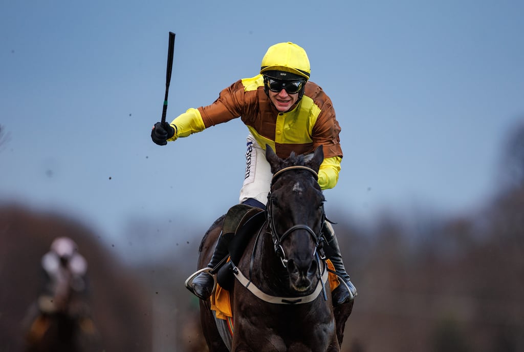 Paul Townend celebrates on Galopin Des Champs as he wins the race. Photograph: James Crombie/Inpho