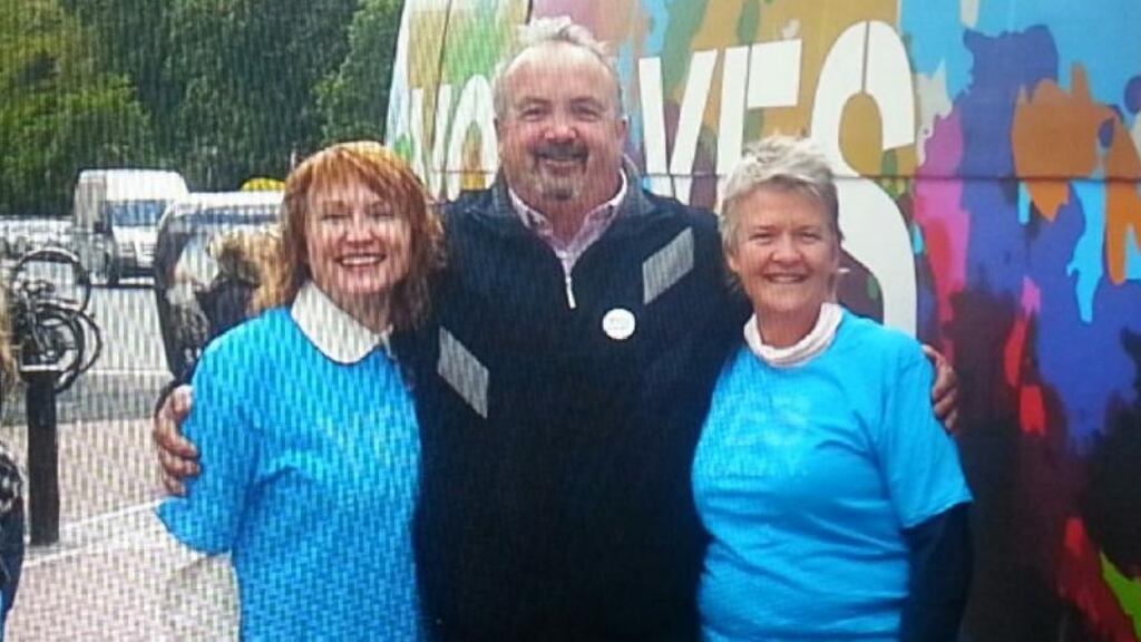 Bus driver Andy Wilkinson with Moninne Griffith(left) and Mary McDermott of the Yes Equality campaign